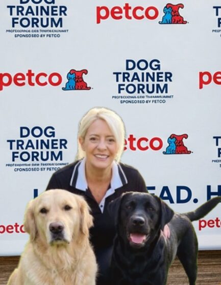 Missy Zipperer of MissPetSit at the Petco Dog Trainer Forum with two dogs